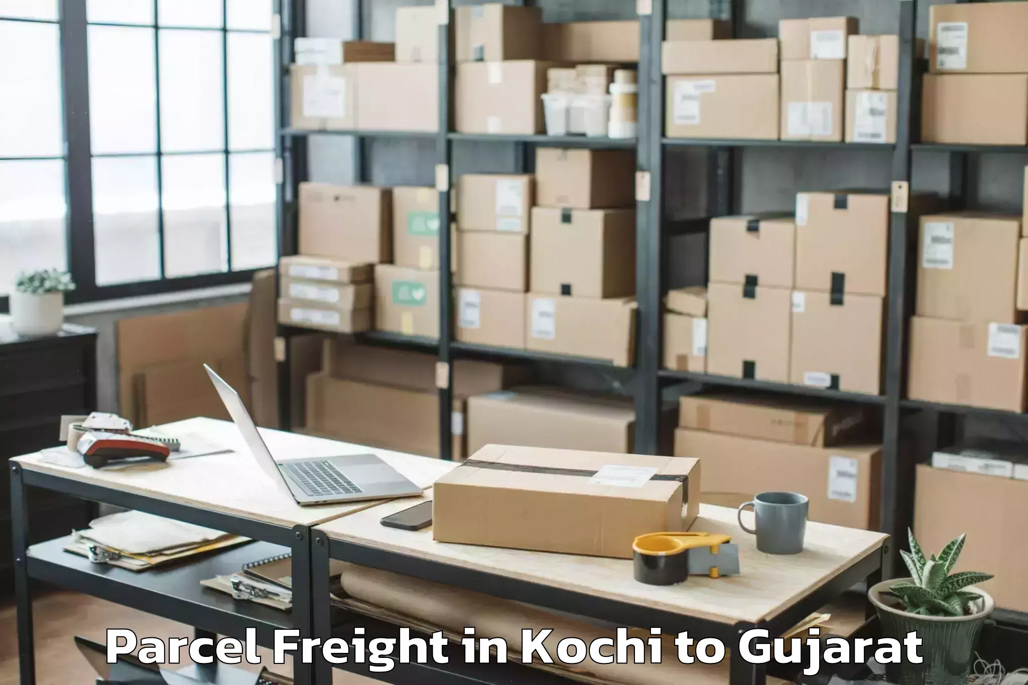 Kochi to Valsad Parcel Freight Booking